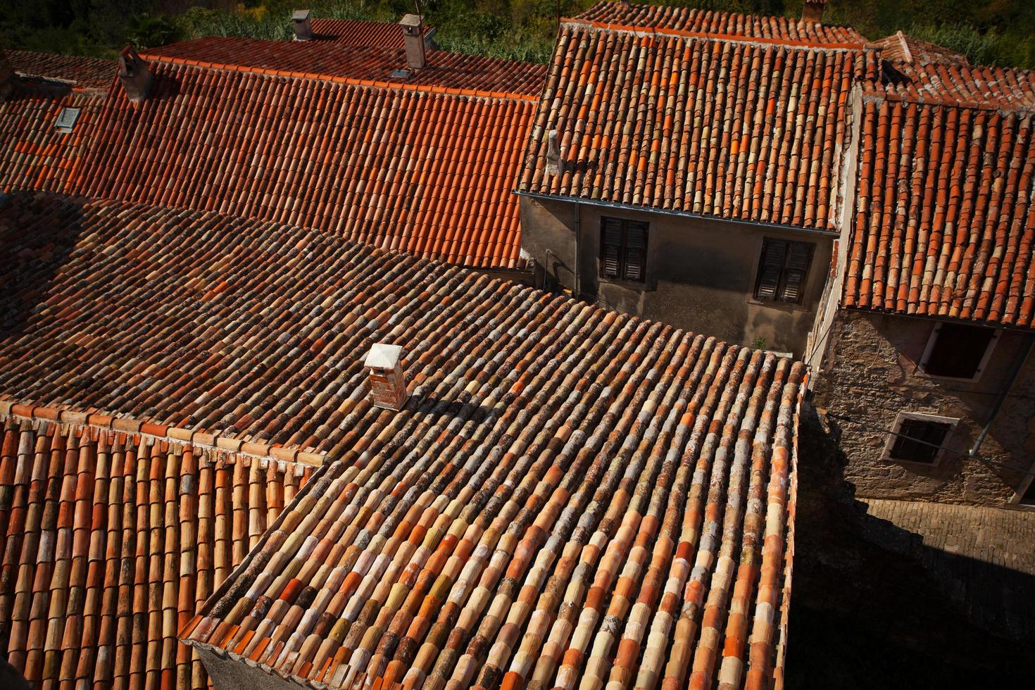 Houses with roofs covered with tiles photo