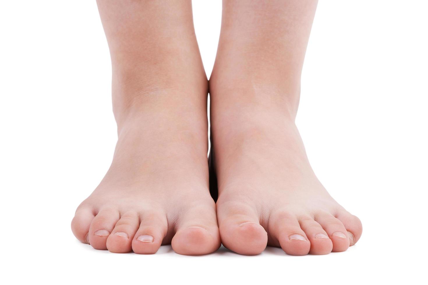 Human feet on a white background photo