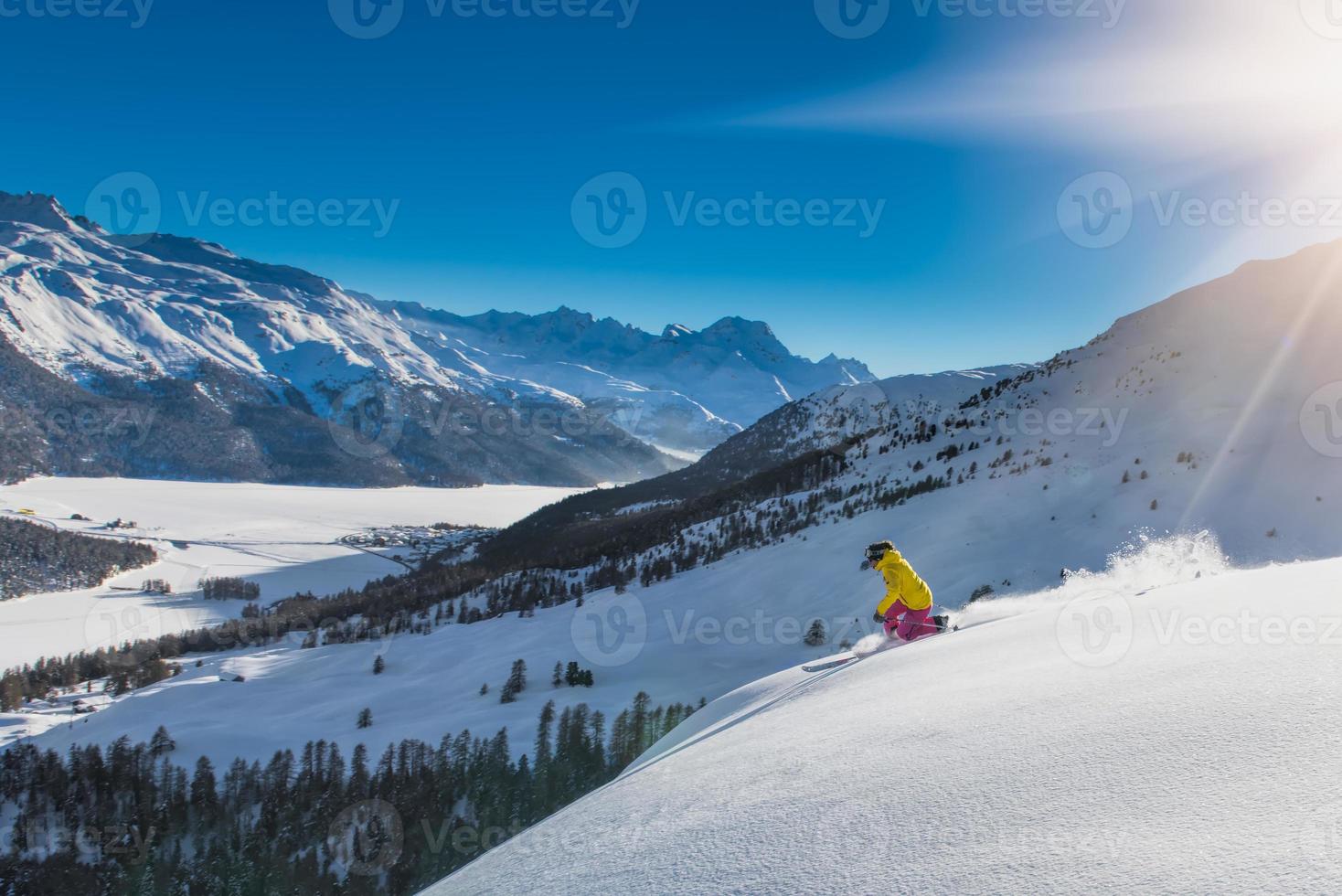 Girl in off-piste skiing photo