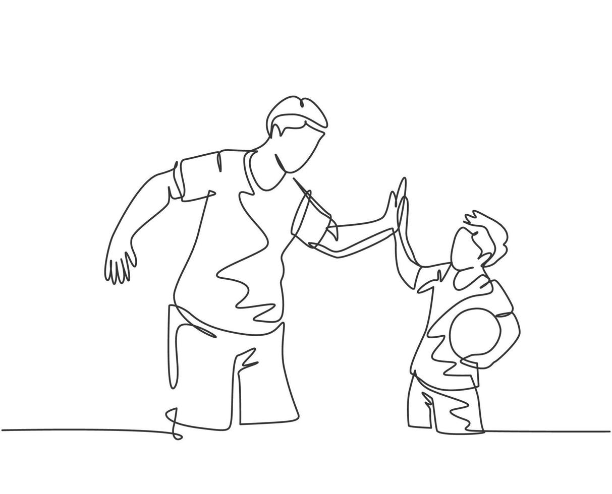 Single line drawing of young happy father and son playing football together on outdoor field and give high five gesture. Parenting concept continuous line draw design vector graphic illustration