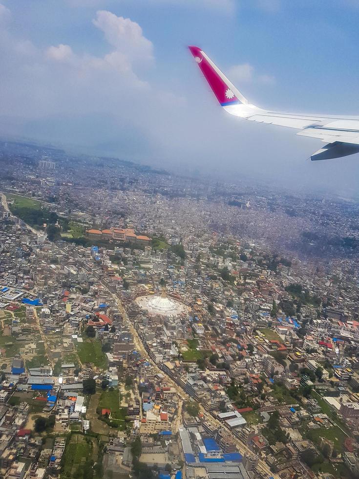 Kathmandu Nepal seen from above through the airplane window. photo