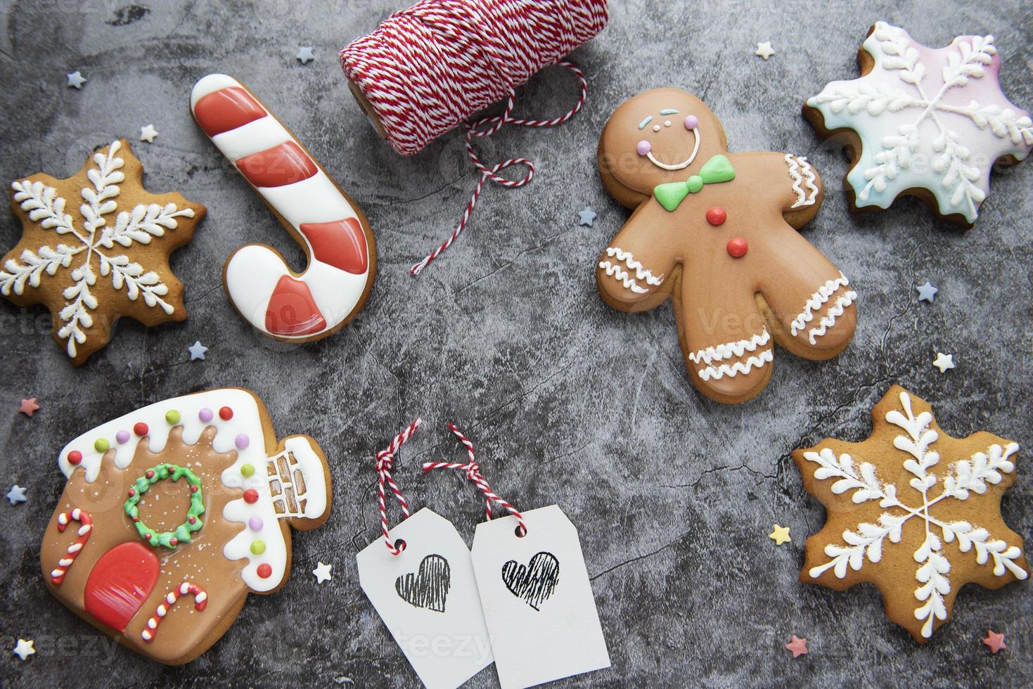 Christmas gingerbread cookies on dark background photo