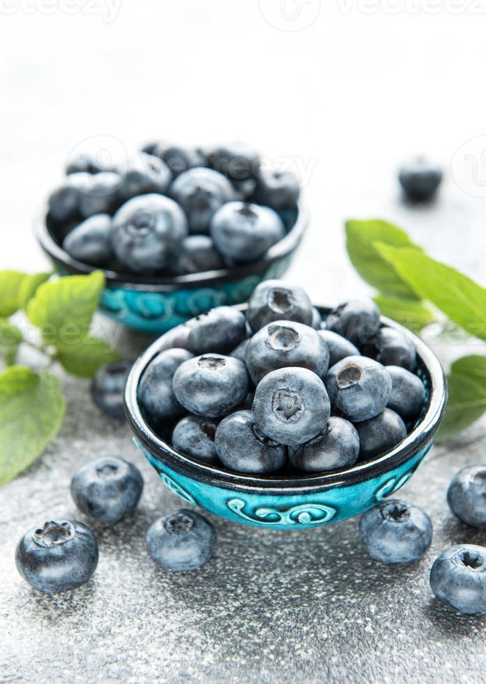 Blueberries on concrete background photo