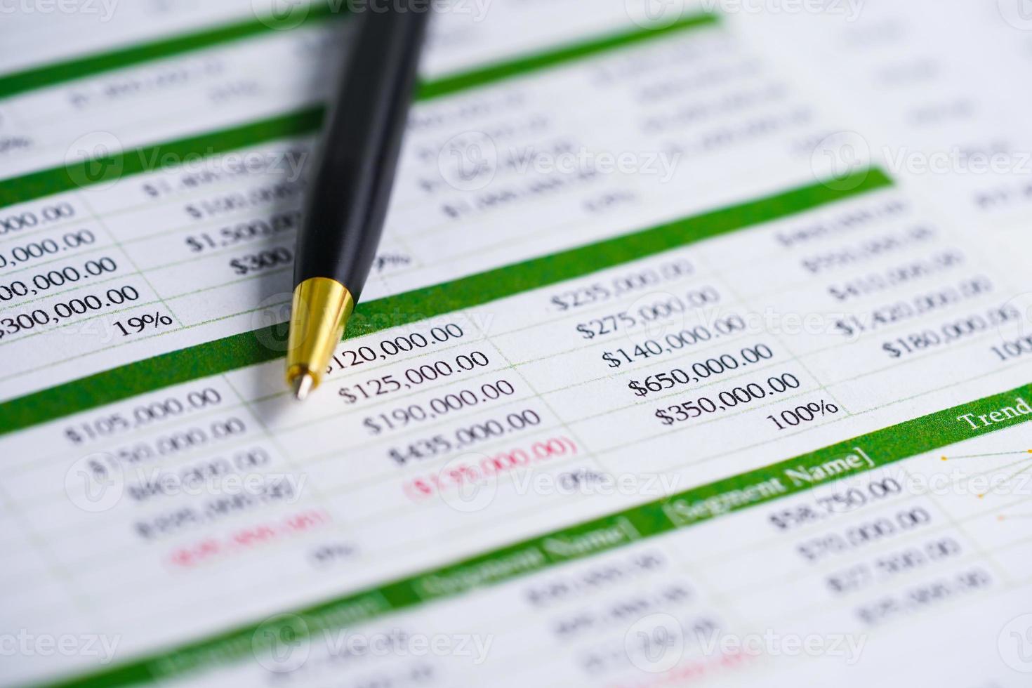 Spreadsheet table paper with pen. Finance development, Banking Account, Statistics Investment Analytic research data economy, trading, office reporting Business company concept. photo