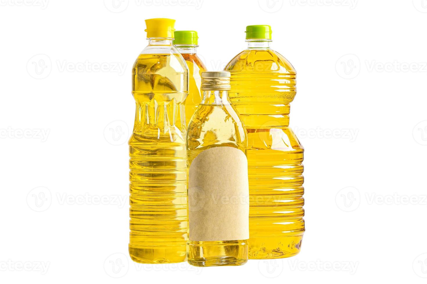 Vegetable oil with olive oil in different bottle for cooking isolated on white background with clipping path. photo