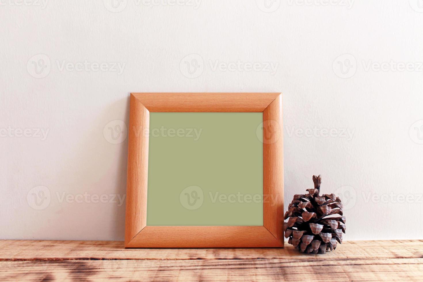 Wooden Frame Mockups with wooden background photo