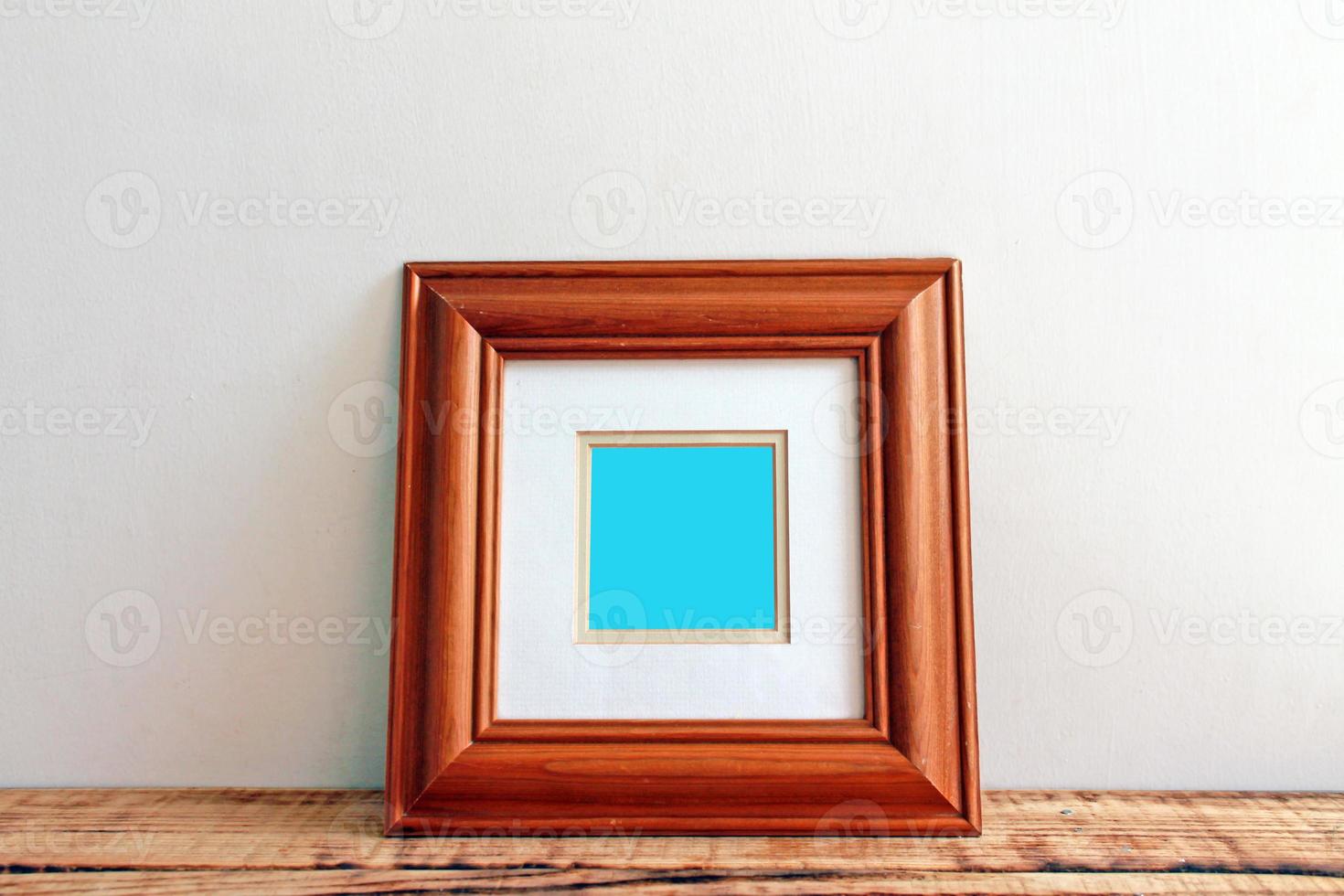 Wooden Frame Mockups with wooden background photo