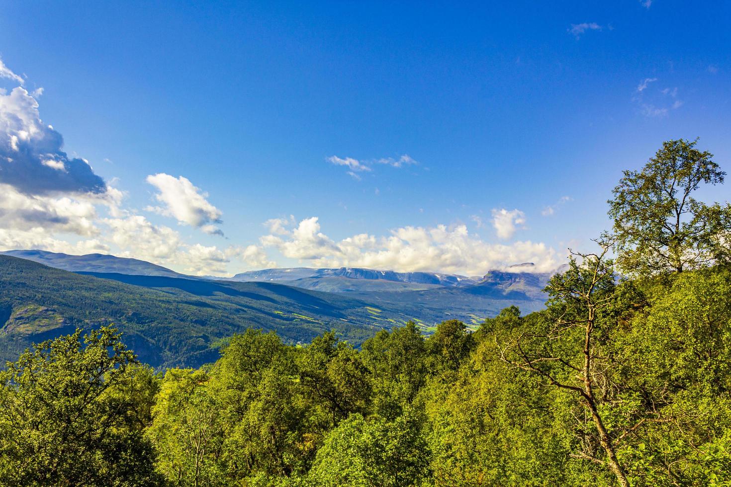 Mountain and forest landscape panorama at sunny day Vang Norway photo