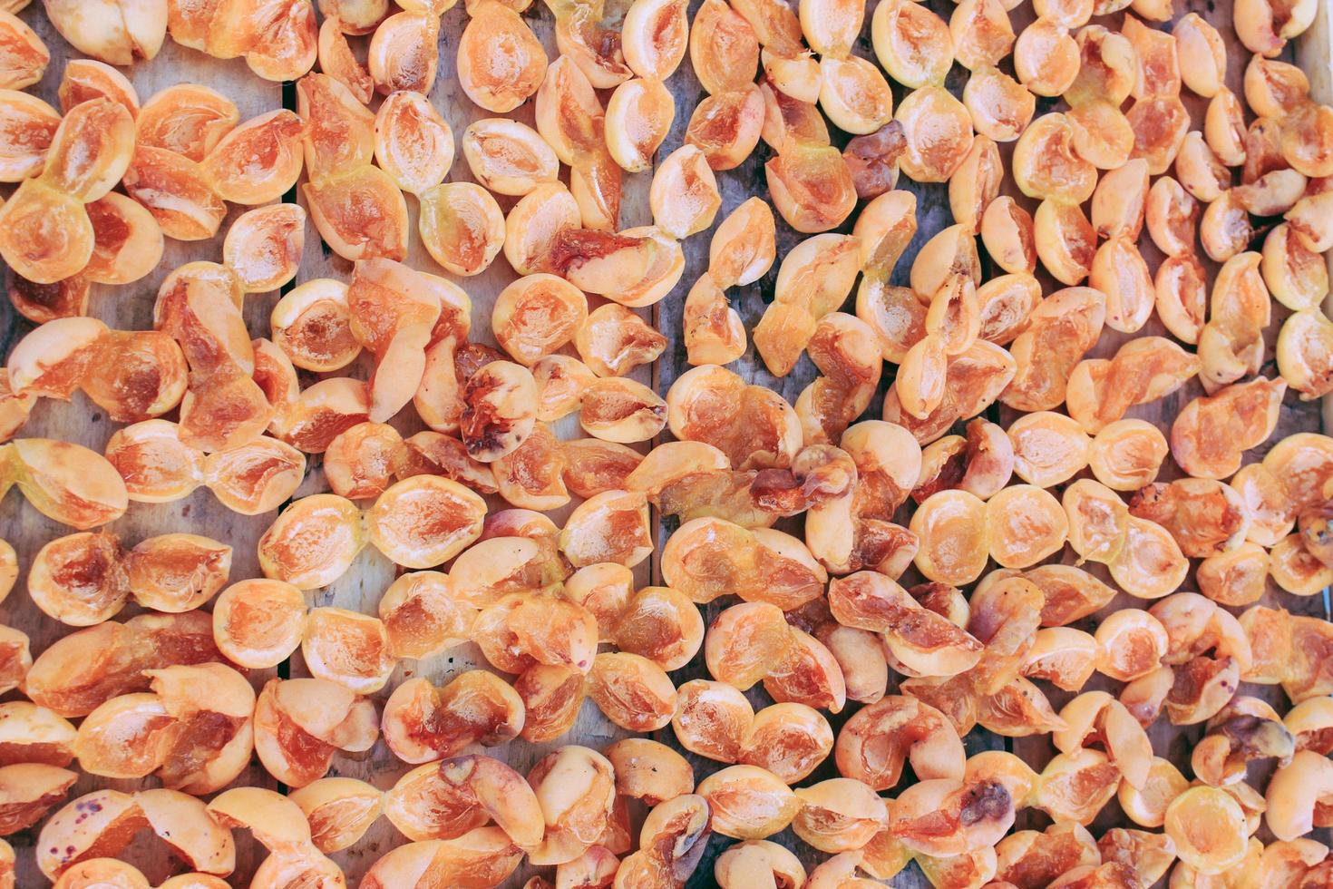 Orange dry apricots pattern background photo