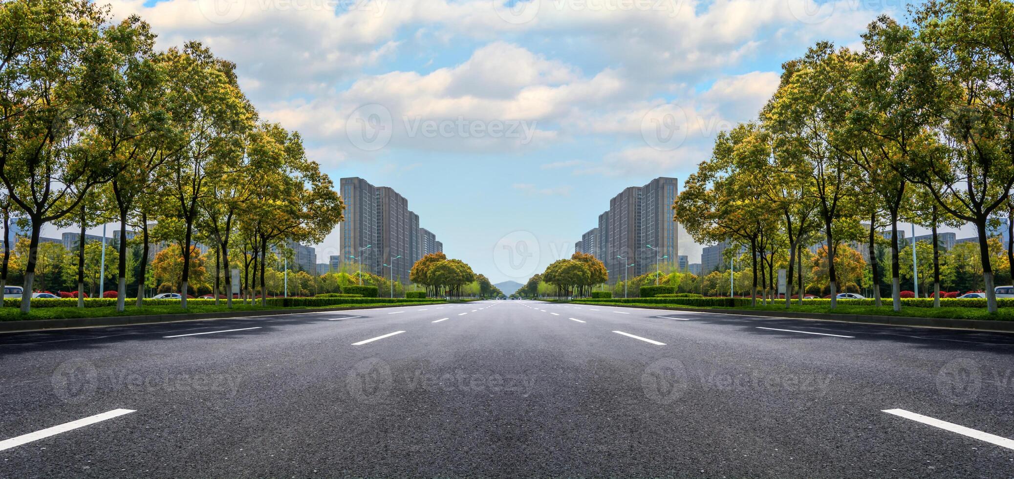 Asphalt road and modern city photo