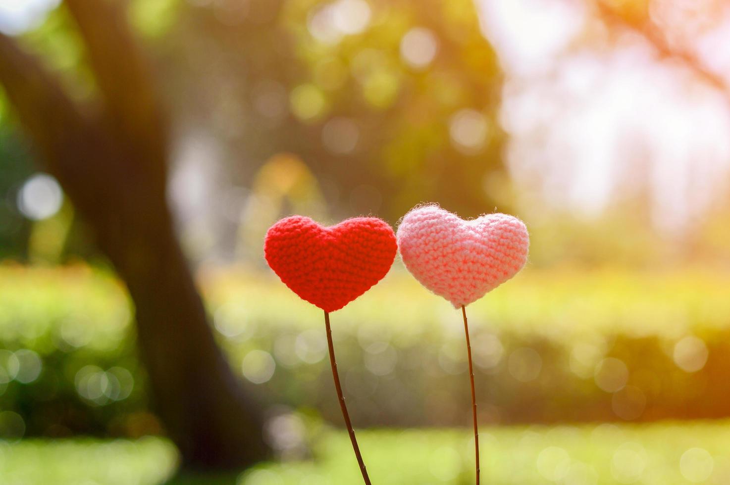 Yarn hear with nature background bokeh for valentines day photo