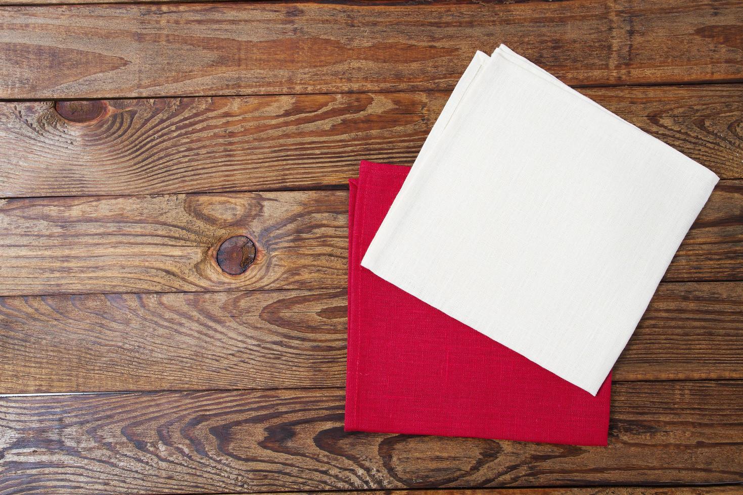 red,white napkins on wooden table, food concept photo