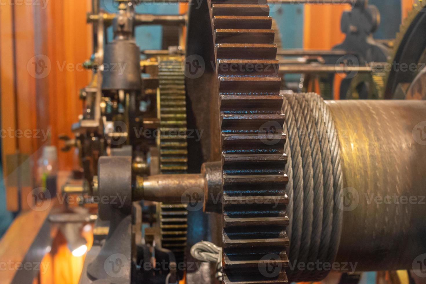 detail of the tower clock mechanism with gearwheels photo