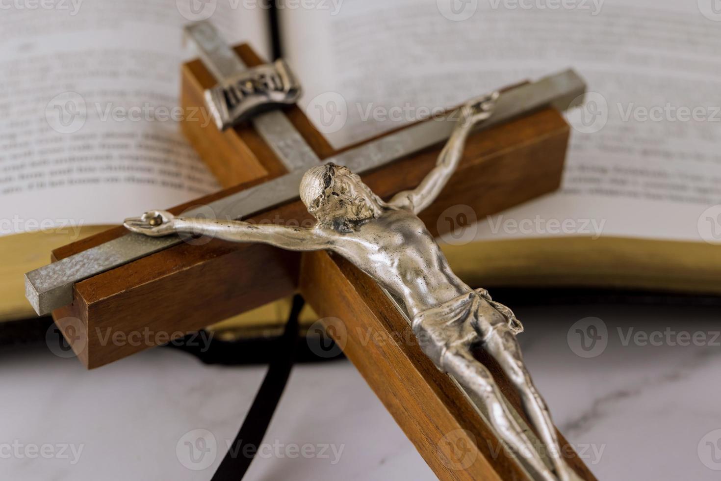 Jesus on the crucifix of salvation way to God through prayer Holy Bible the Christian cross the hope of mankind photo