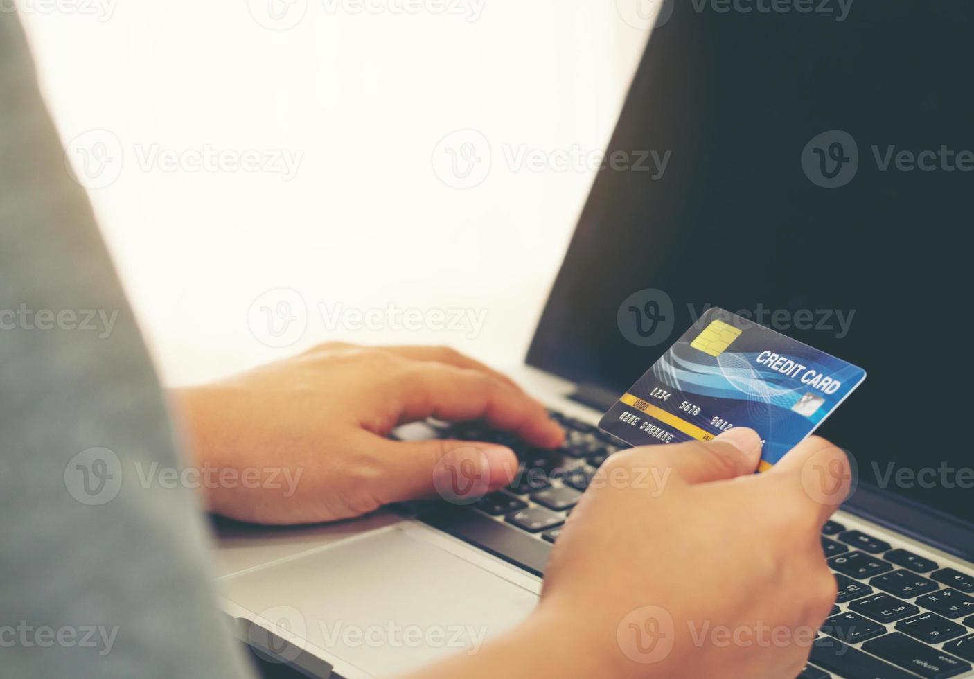 Women use credit card to shopping online photo