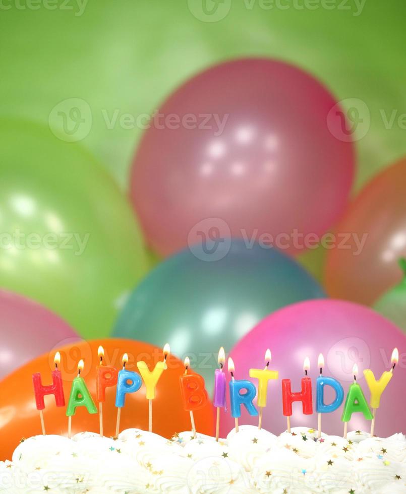 Celebration with Balloons Candles and Cake photo