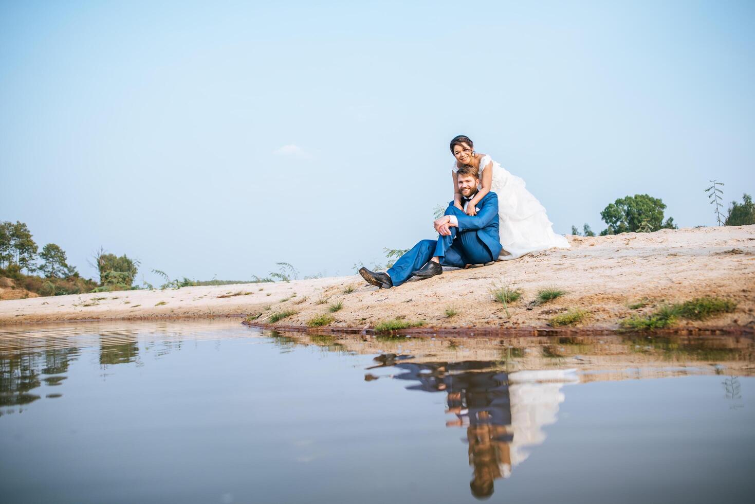 Asian bride and Caucasian groom have romance time and happy together photo