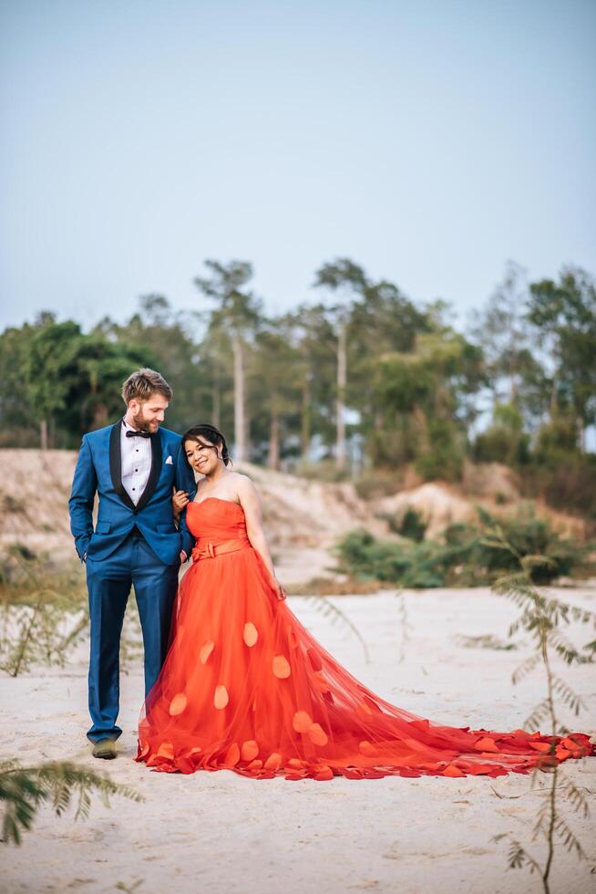 Asian bride and Caucasian groom have romance time and happy together photo