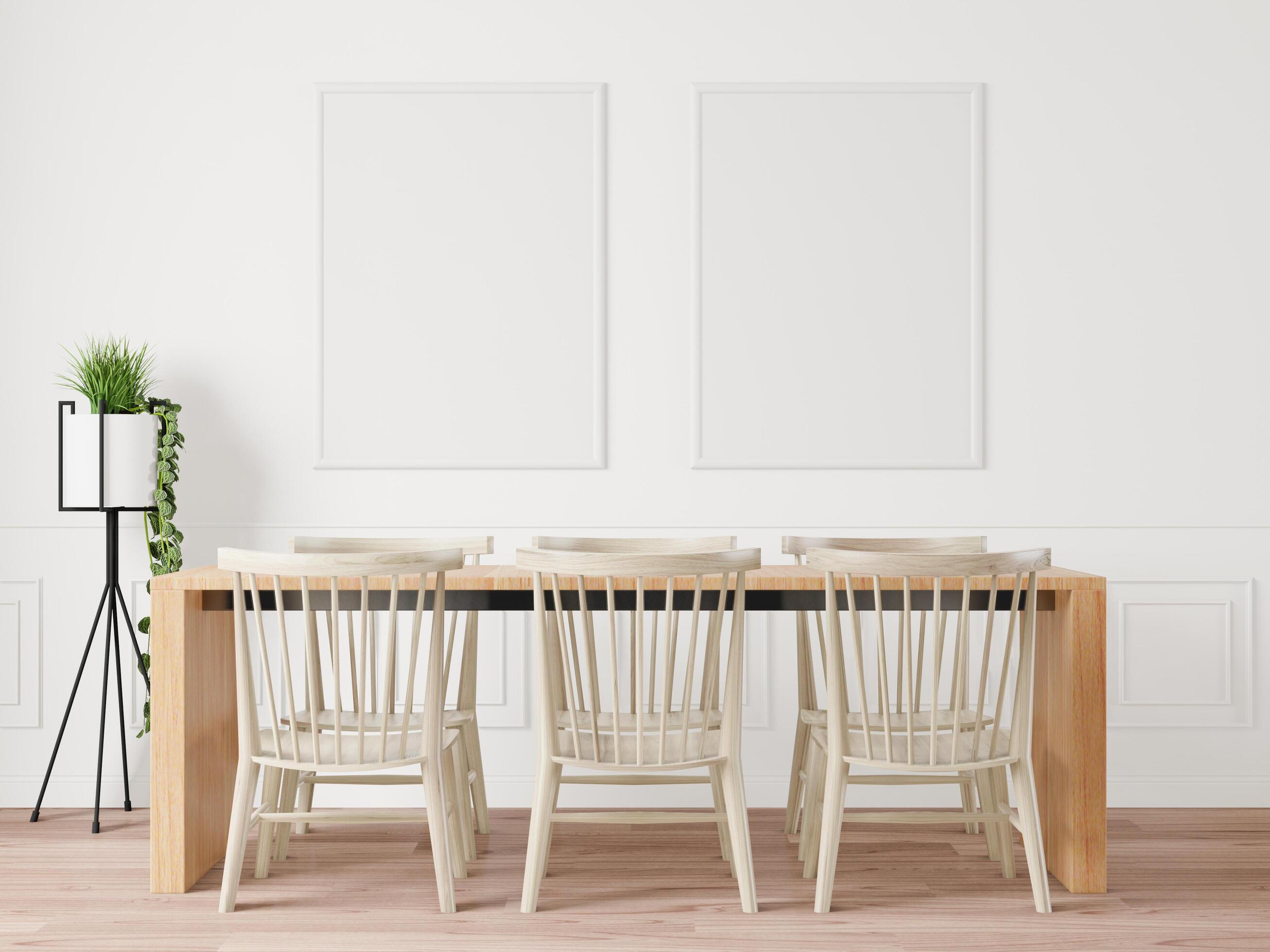 The dining table set in the room has a picture frame attached to the