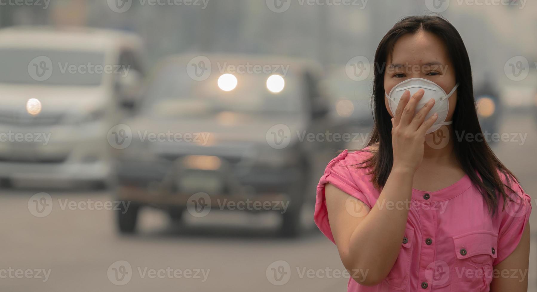 Young woman wearing protective mask photo
