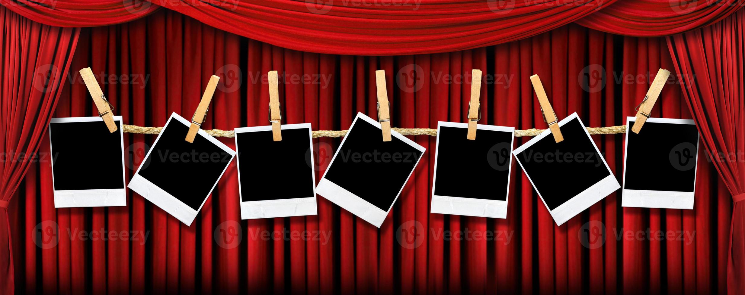 Red Theater Drapes and Polaroids With Dramatic Light and Shadows photo