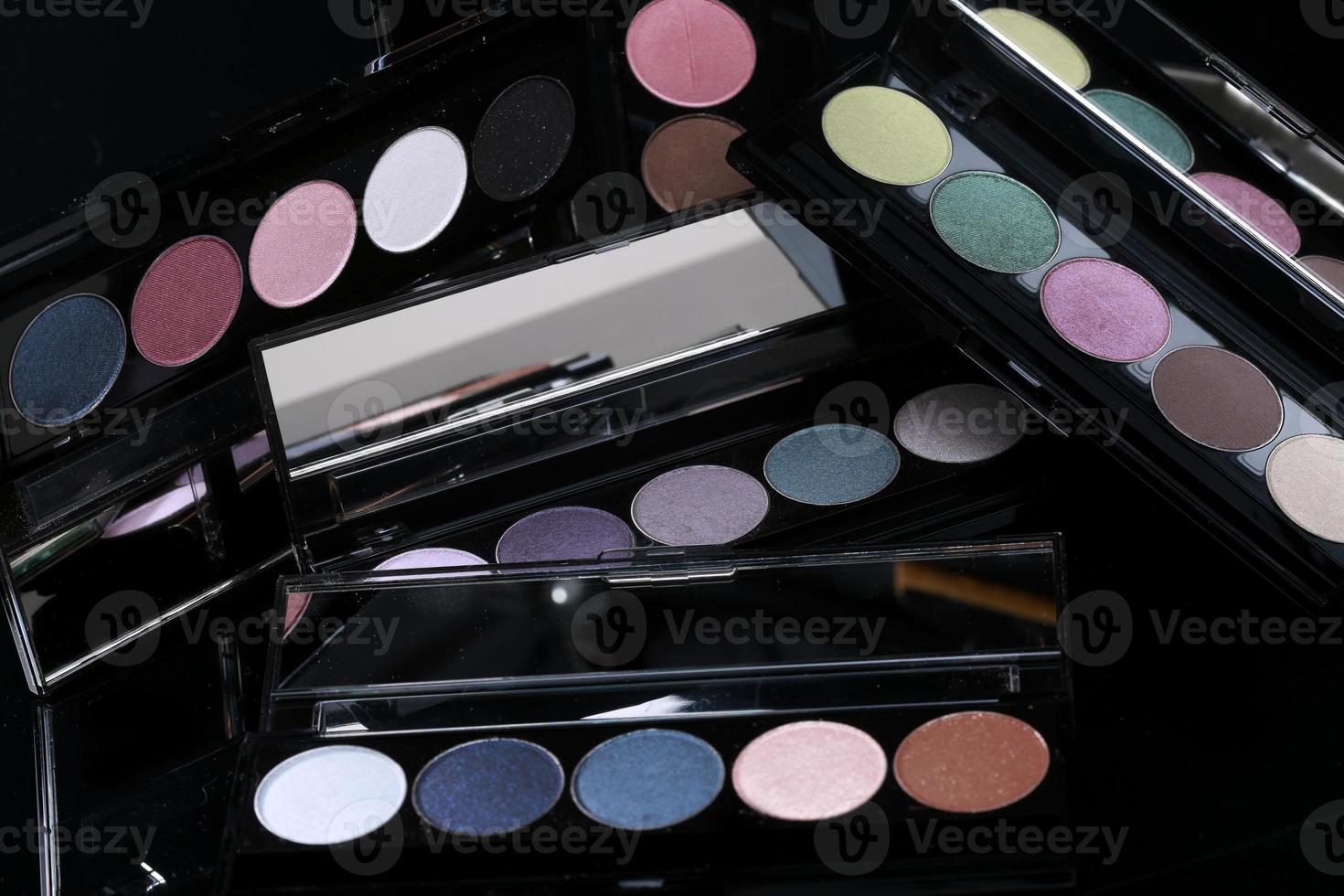 Colorful Eyeshadow Collections on Black Background photo