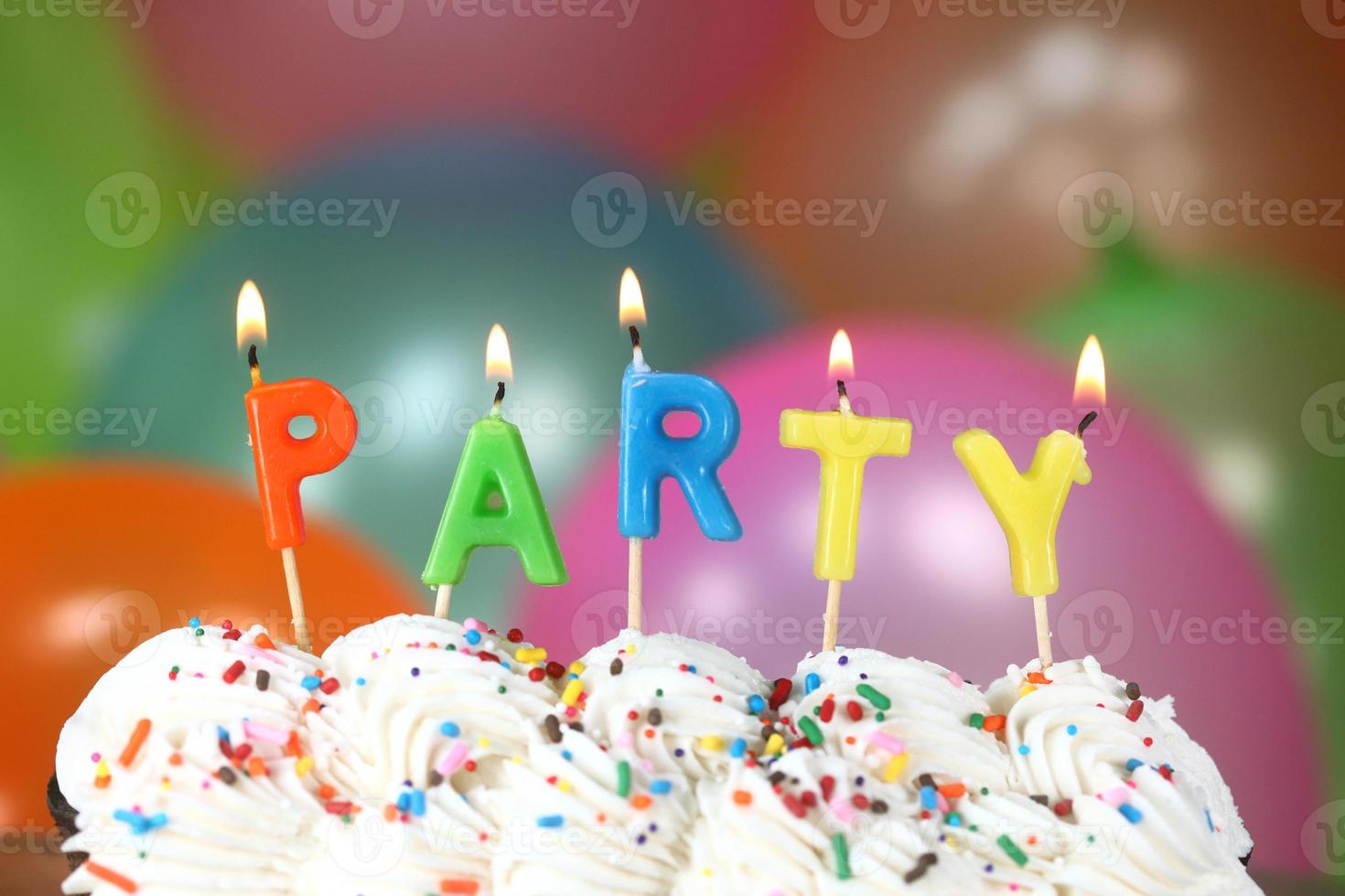 Celebration with Balloons Candles and Cake photo