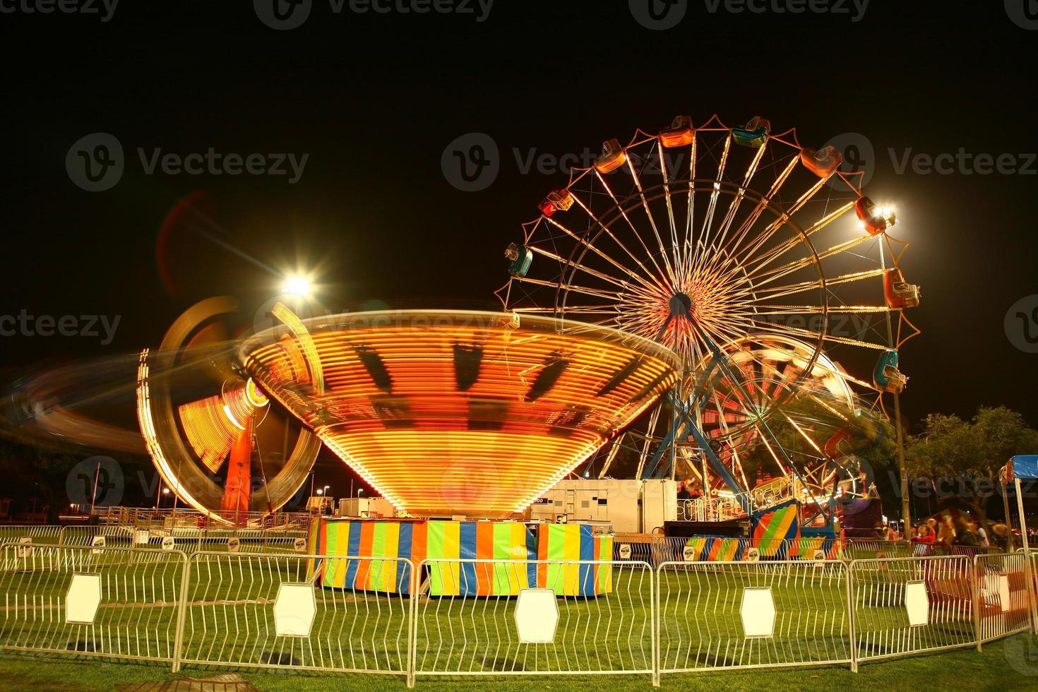 Vintage Carnival at Night With Motion Blur photo