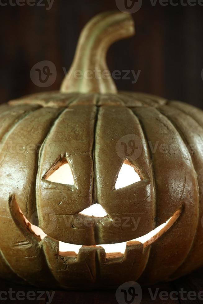 Calabaza de Halloween sobre fondo de madera grunge rustick foto