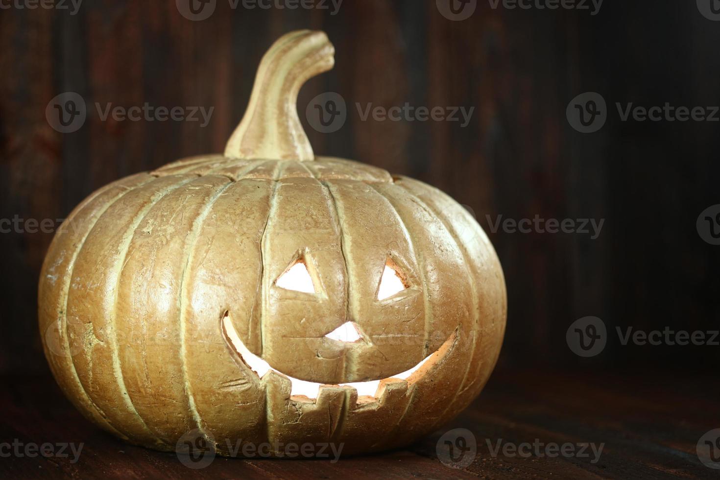 Halloween Pumpkin on Wood Grunge Rustick Background photo