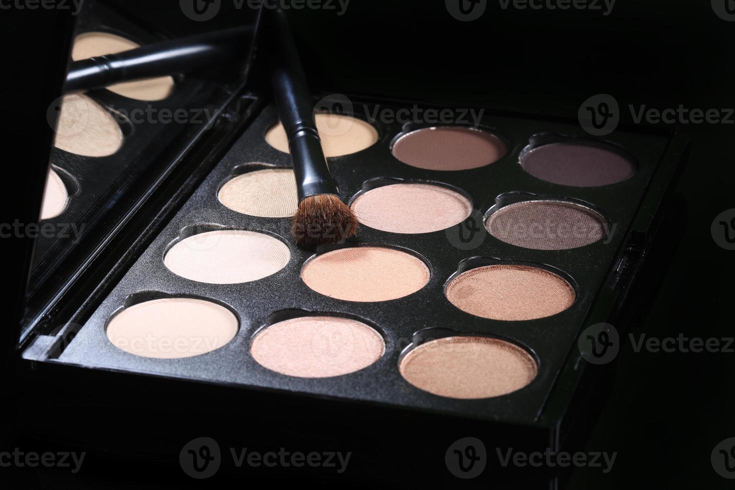 Colorful Eyeshadow Collections on Black Background photo
