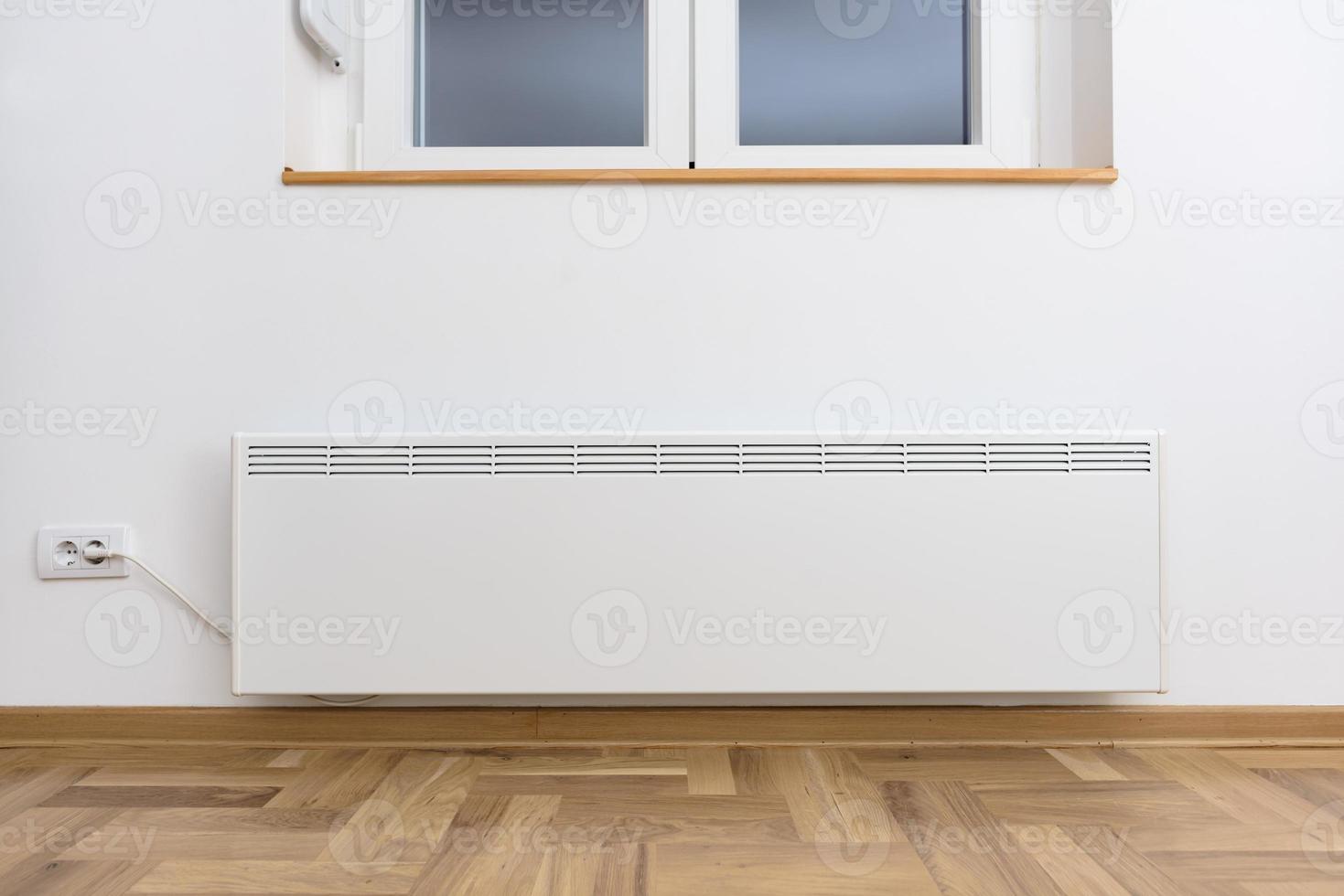 Smart heater convector. Smart Home with the smart heating system. Electric panel heating concept. photo