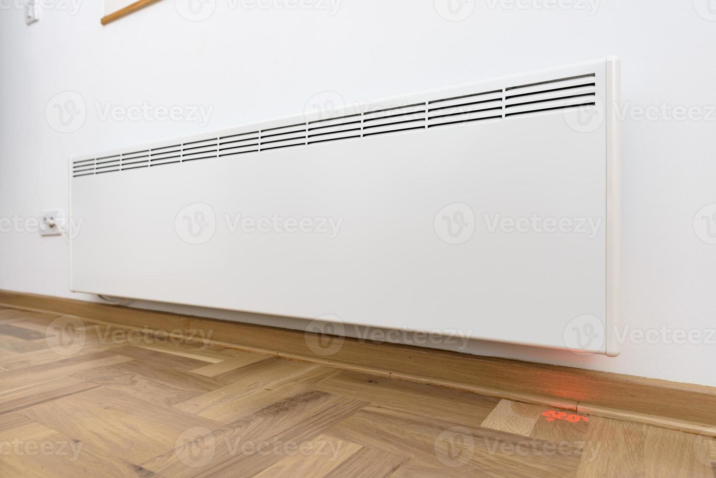 Smart heater convector. Smart Home with the smart heating system. Electric panel heating concept. photo