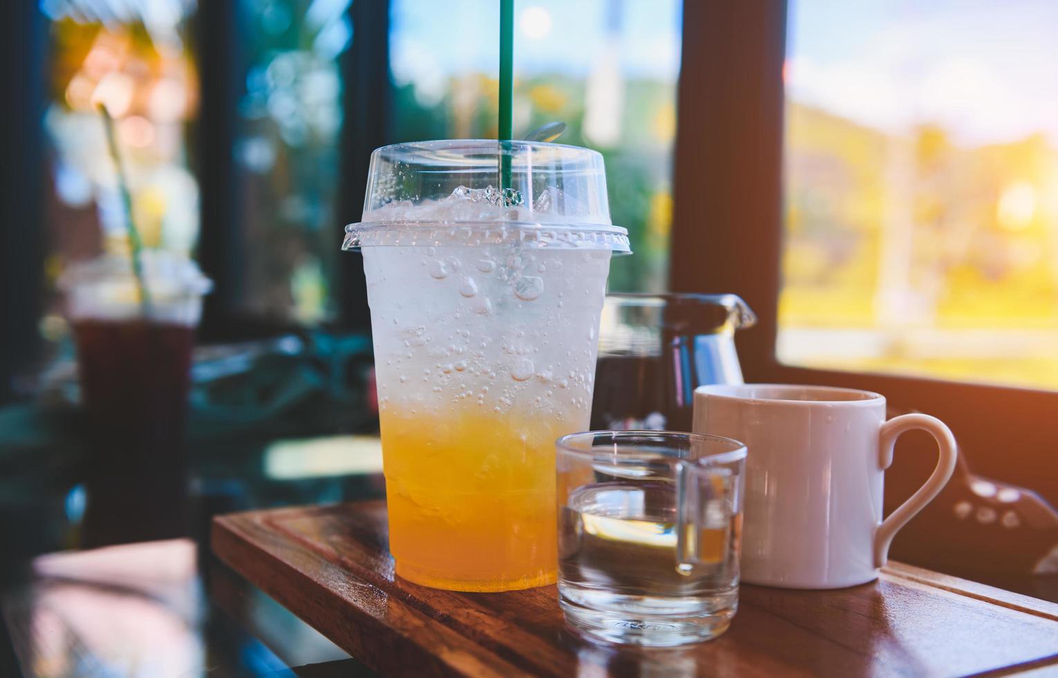 Orange lemon juice with soda ice and cold drink. photo