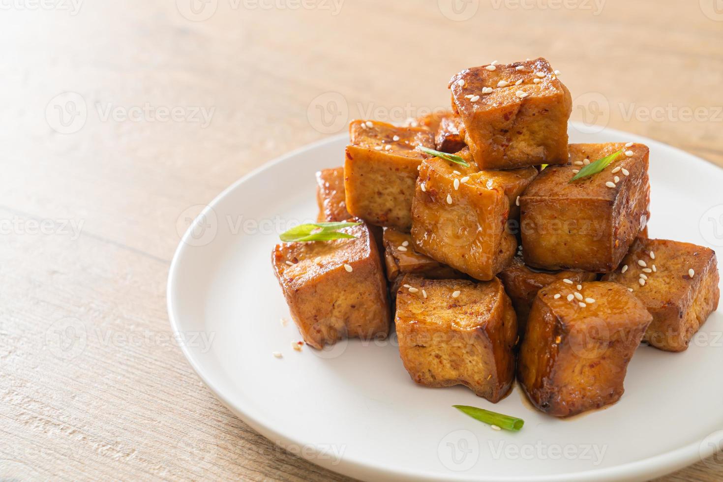 fried tofu with white sesame and teriyaki sauce photo