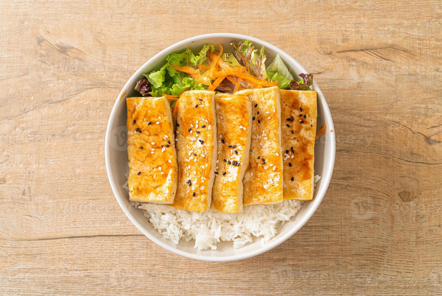 teriyaki tofu rice bowl - vegan food style photo