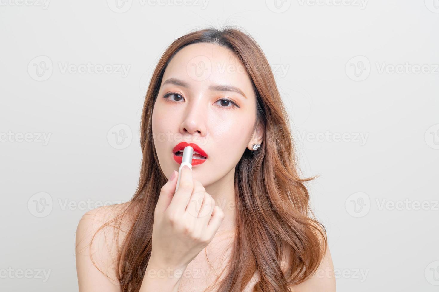 portrait beautiful woman make up and using red lipstick photo