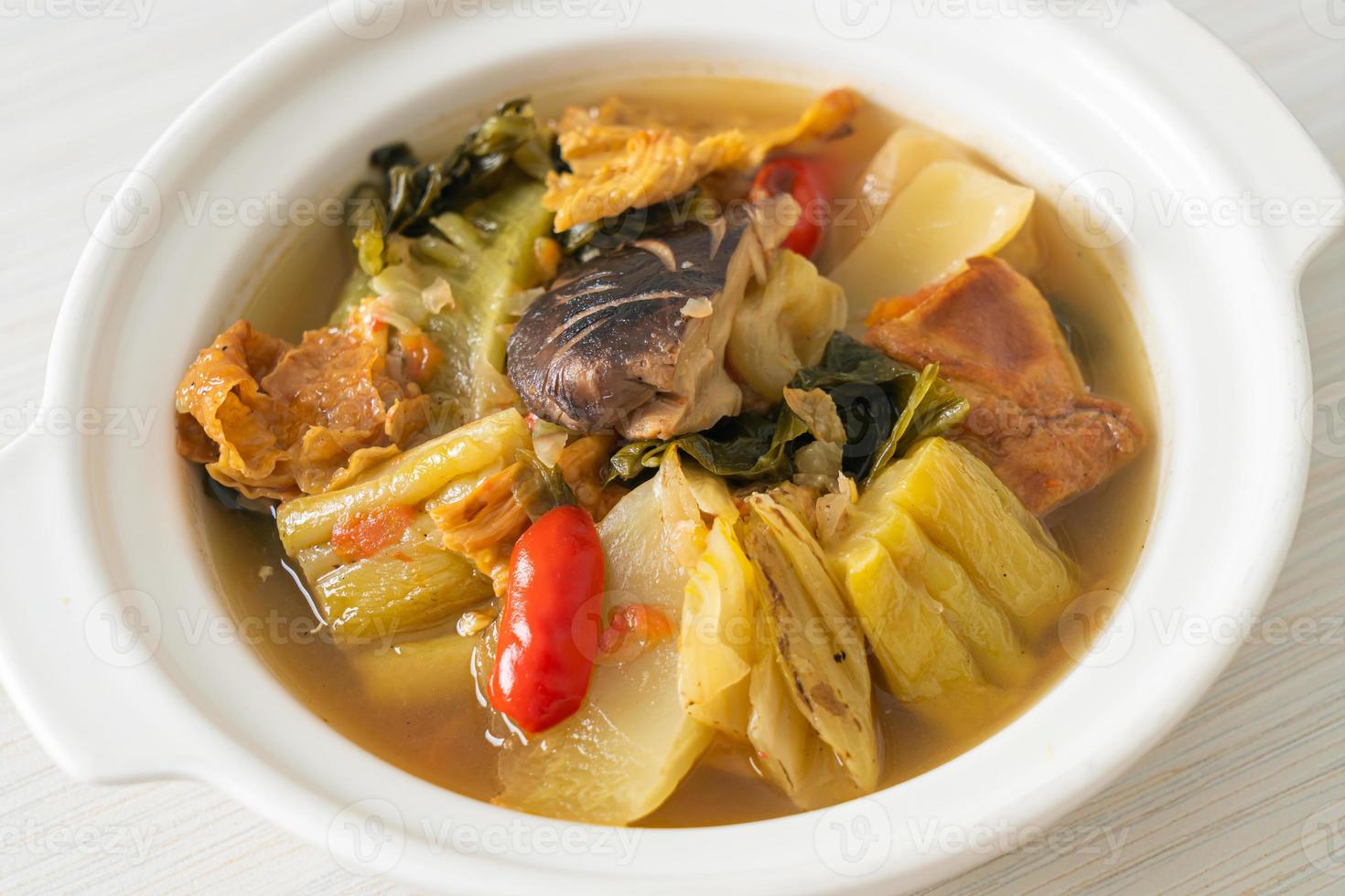 boiled pickled cabbage and bitter gourd soup photo