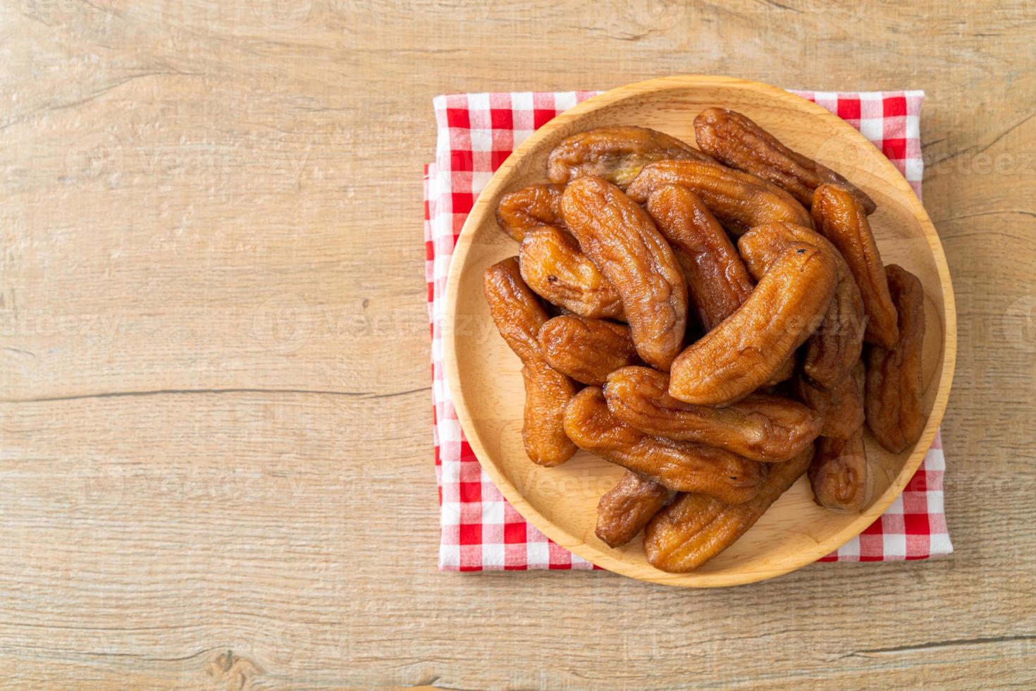 sun dried banana on plate photo