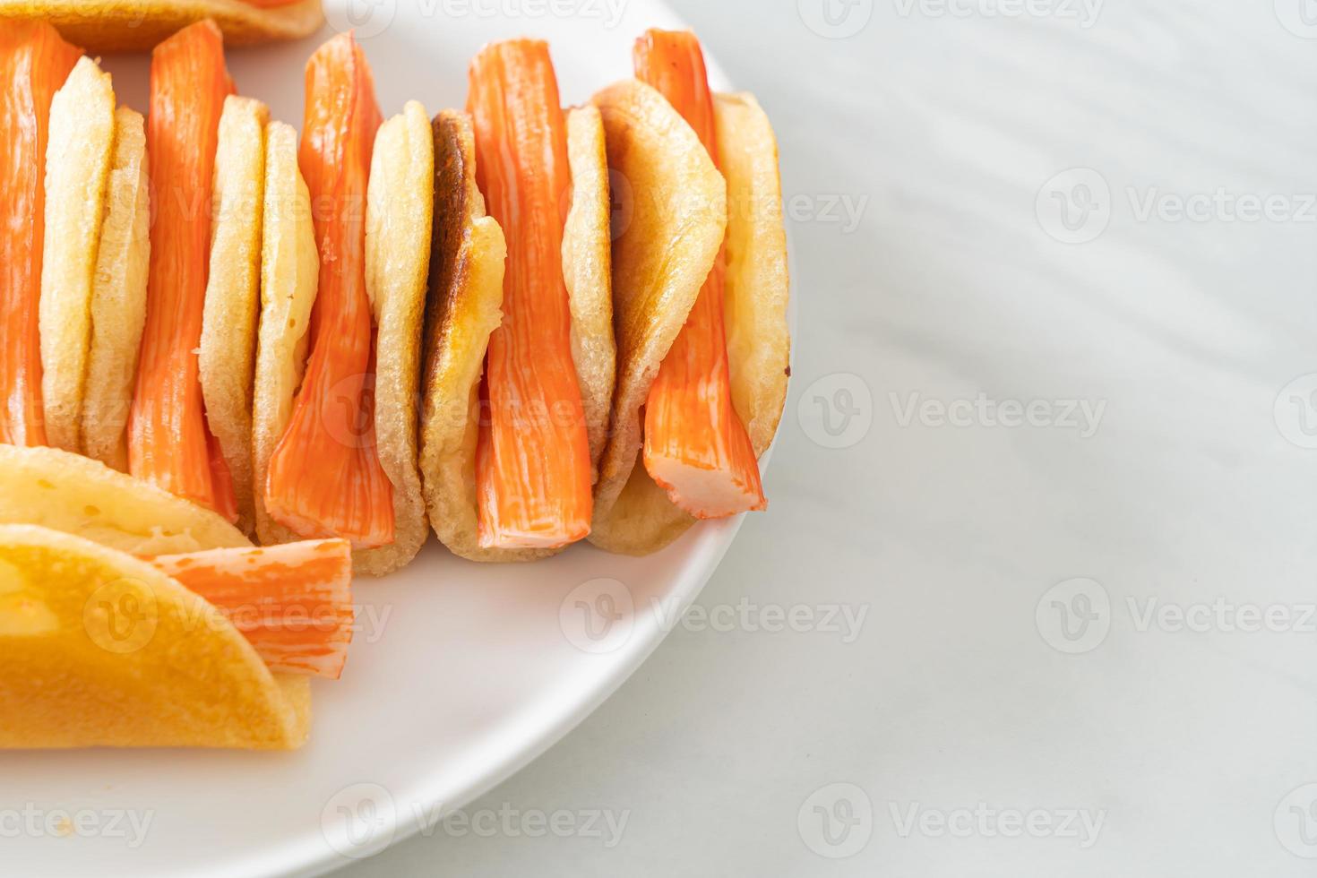 flat pancake roll with crab stick photo