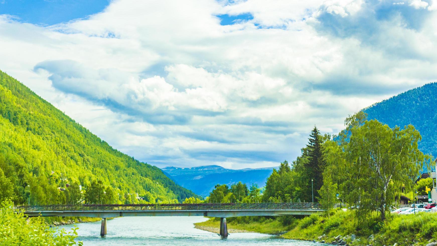 Incredible norwegian landscape bridge mountains fjord forests Jotunheimen Norway photo