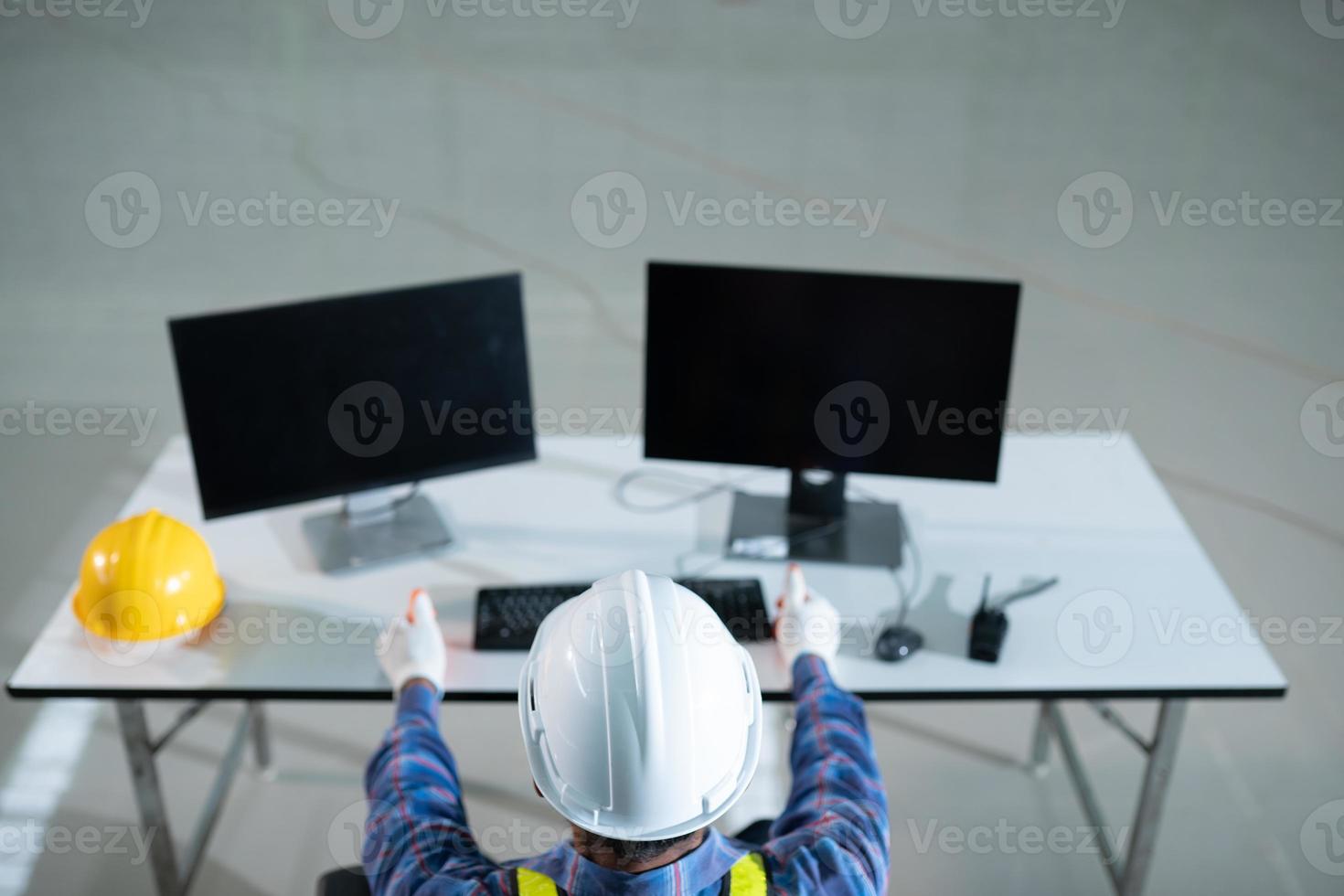 Top View engineering computer using operate in the warehouse office photo