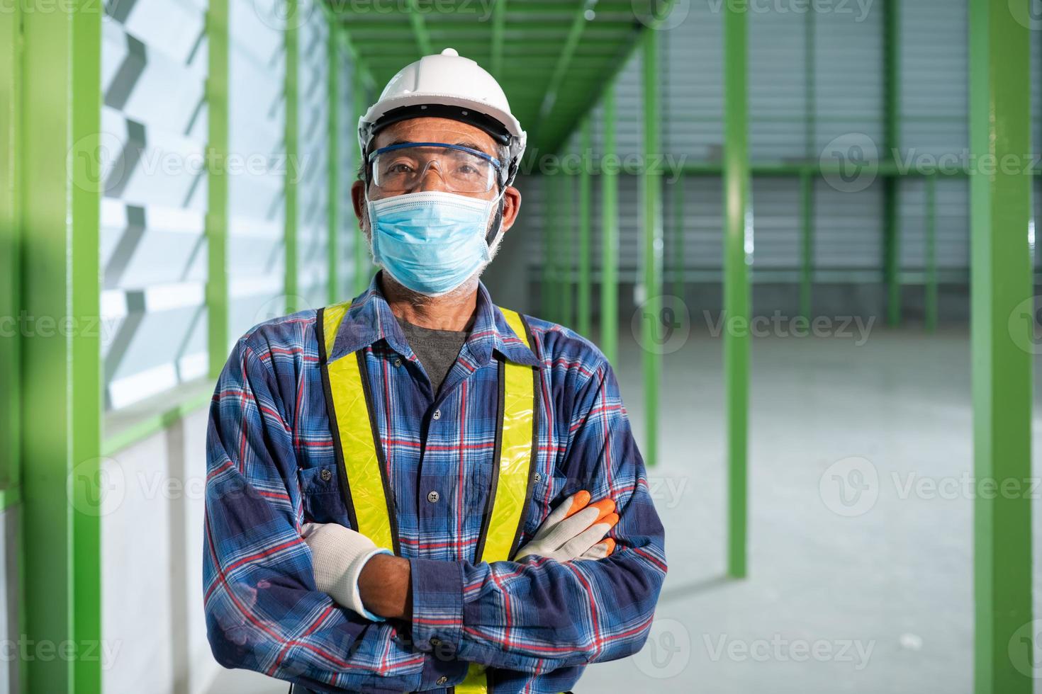 Senior engineer wearing a mask to work new normal photo