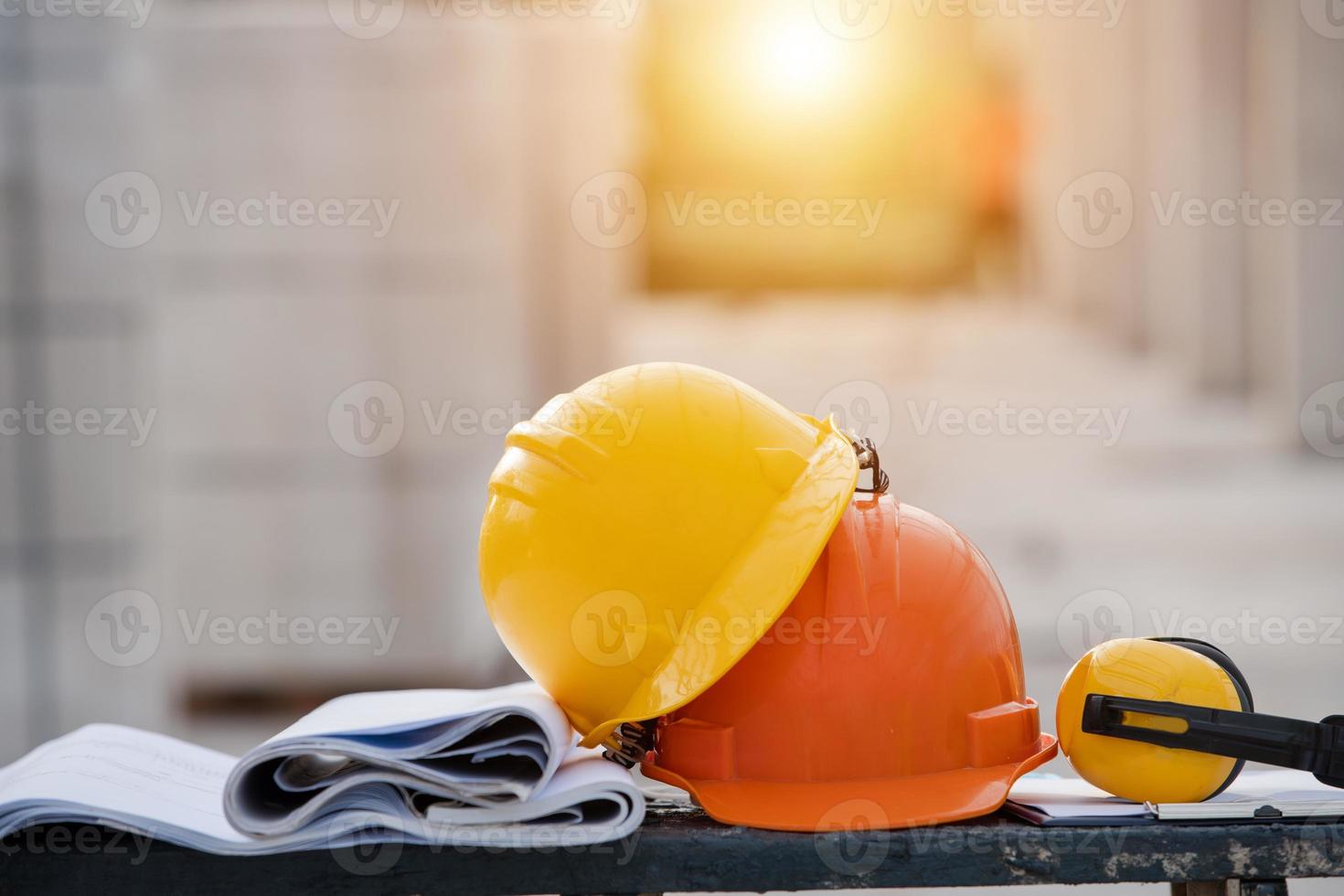 Close-up helmet in the construction site photo