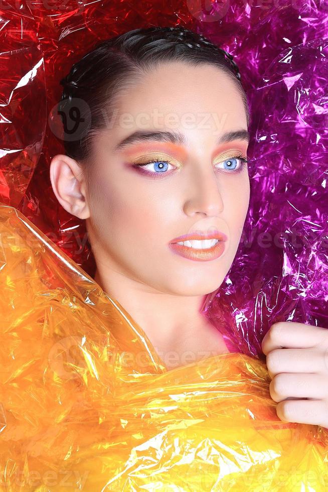 Beauty Image of a Woman Wrapped in Cellophane photo