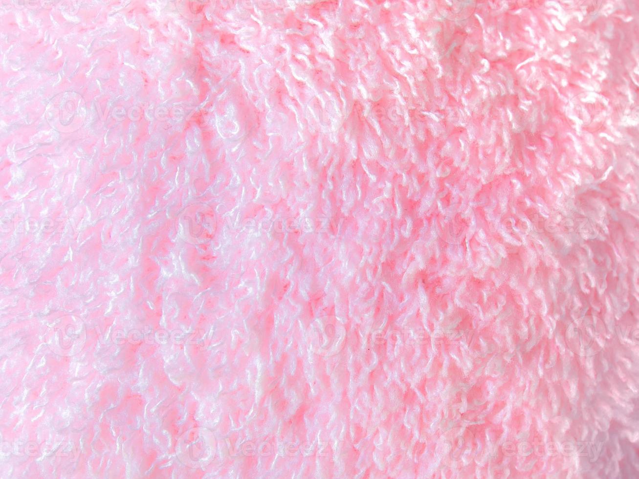 Texture of pink color fur fabric photo