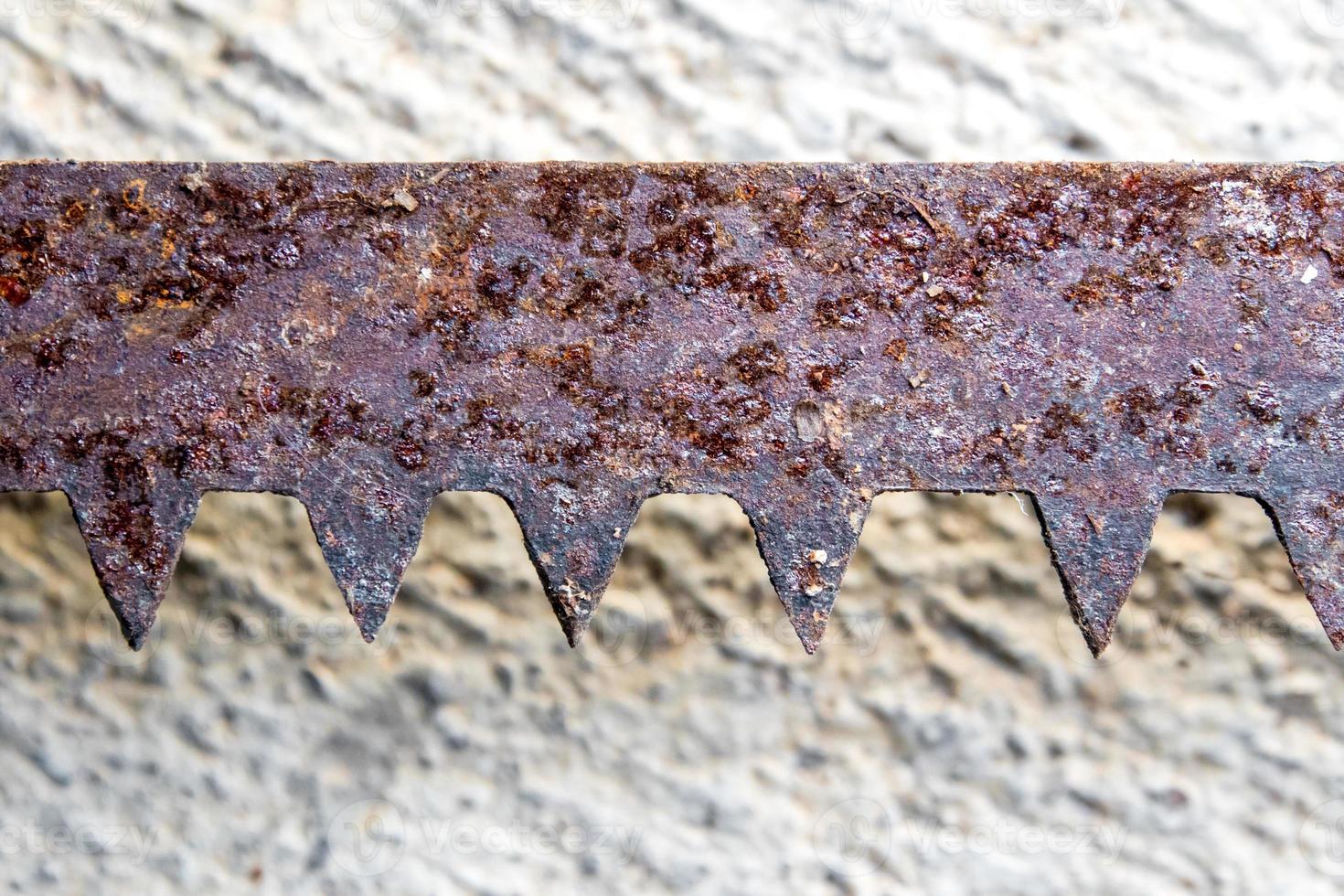 The sharpness of saw blade is old and rusty photo