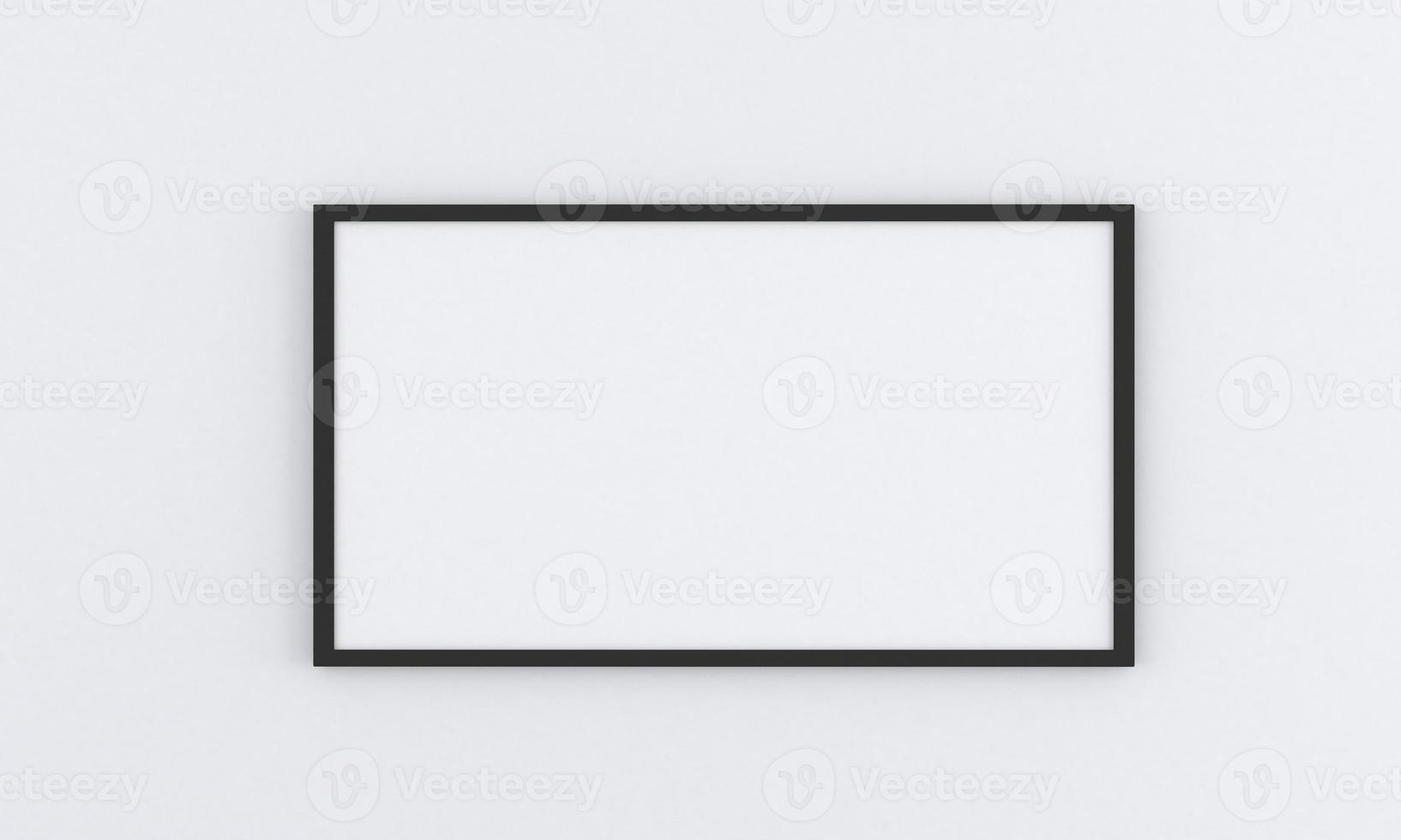 Black empty frame mockup on gray wall photo