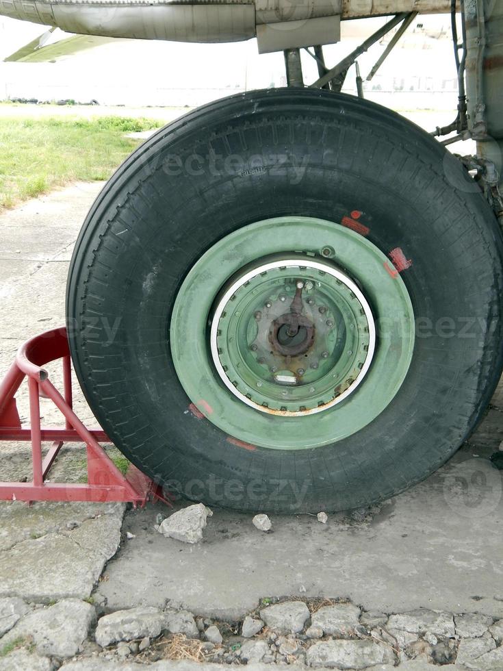 Aviation chassis of an airplane and a helicopter at the airport photo