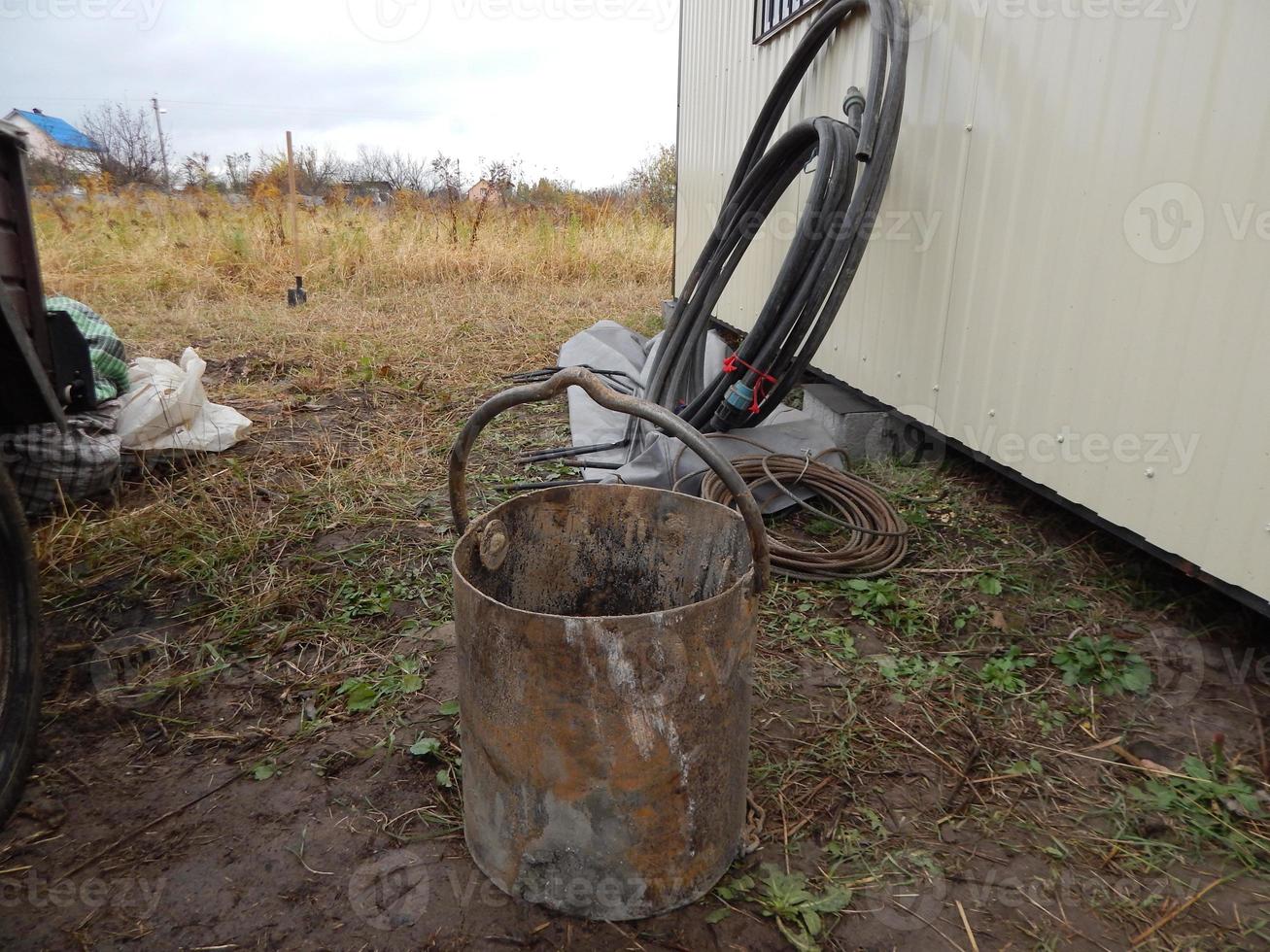 Construction of a drinking well at the dacha photo